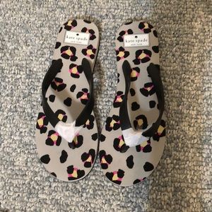 Kate Spade cyber cheetah print flip flops